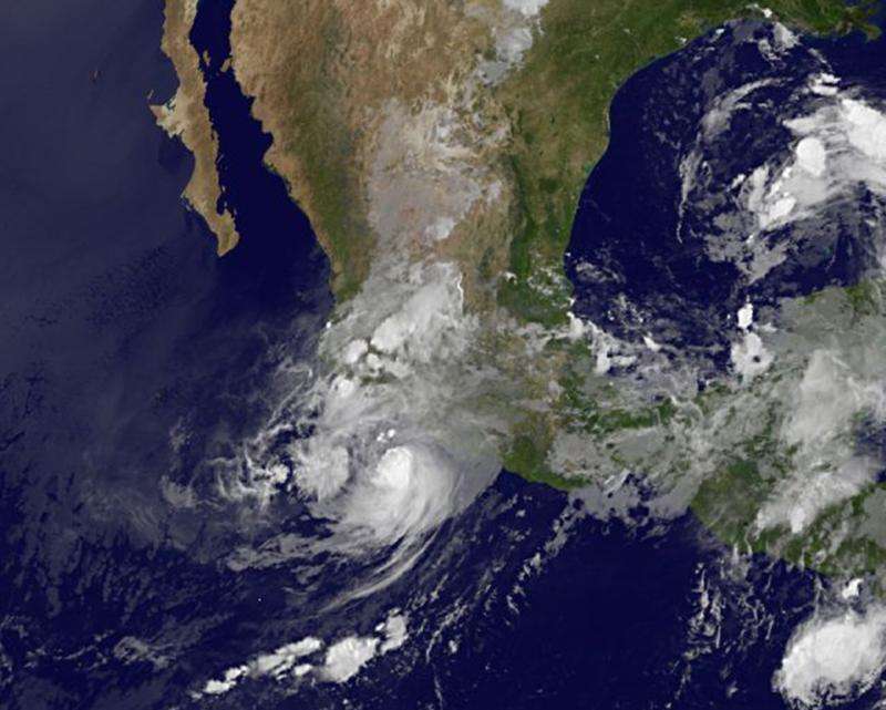 NASA sees Tropical Storm Carlos hugging Mexico's west coast