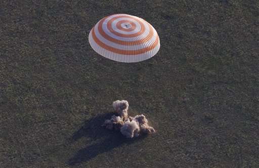 3 space station astronauts safely return to Earth