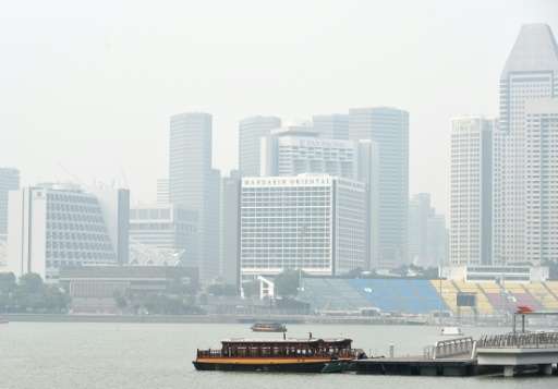 A general view shows buildings in the business district blanketed with haze in Singapore on September 8, 2015