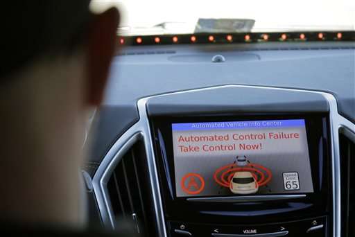 How can people safely take control from a self-driving car?