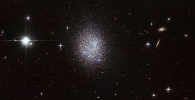 Image: Hubble's compact blue dwarf galaxy UGC 11411