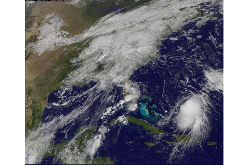 NASA sees wind shear affecting Tropical Storm Joaquin