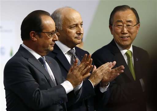 Nearly 200 nations pledge to slow global warming