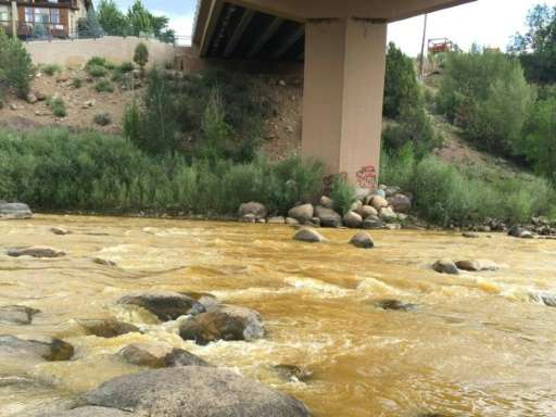 Photo released by the US Environmental Protection Agency (EPA) on August 7, 2015 shows the orange-colored Animas River near Dura