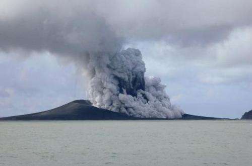 Smoke rises from a volcano some 65 km south-west of the South Pacific nation Tonga's capital Nuku'alofa, as seen in this image f