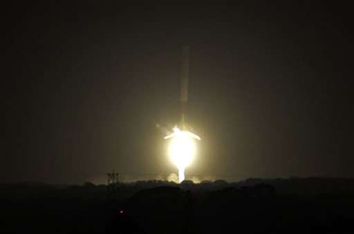 SpaceX launches rocket six months after accident, then lands