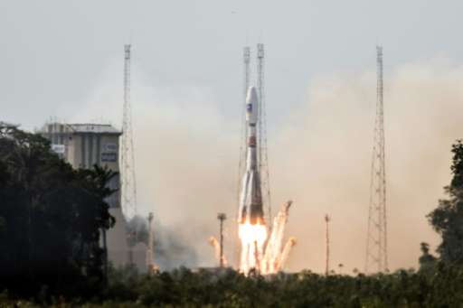 A Soyuz rocket carrying a pair of Galileo In-Orbit Validation satellites lifts off from Europes Spaceport in Sinnamary, 12km fr