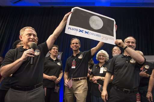 Pluto up close: Spacecraft apparently makes successful flyby