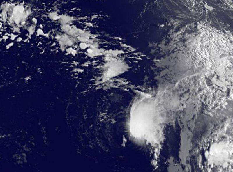 Satellite shows Tropical Depression 9 weakening