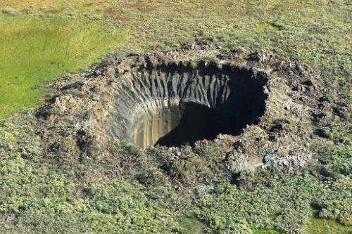 An aerial view taken on August 25, 2014, shows a crater on the Yamal Peninsula, northern Siberia