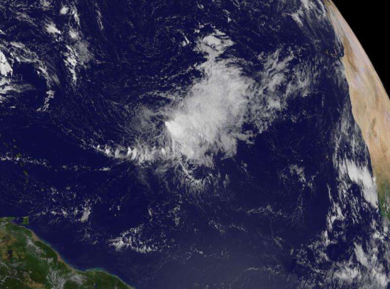 NASA, NOAA satellites show wind shear affecting Tropical Storm Ida