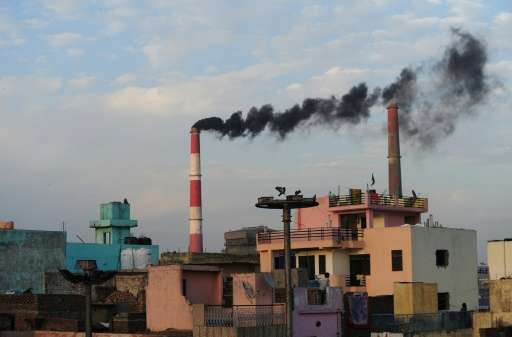 Smoke rises from the Badarpur Thermal Power Station in New Delhi