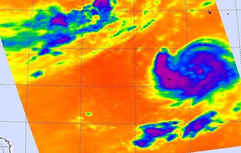 NASA sees Tropical Storm Kilo wrapped halfway around itself