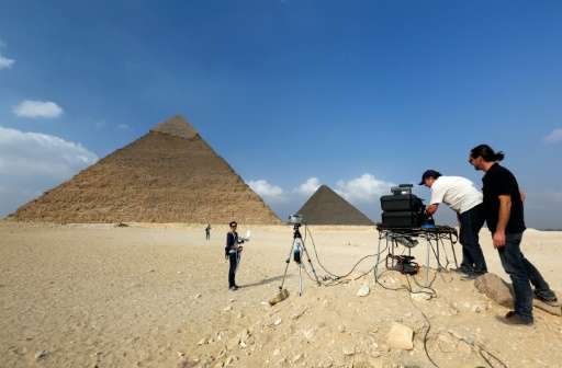 A photo released by researchers on November 10, 2015 shows engineers from the &quot;ScanPyramids&quot; project using infrared th