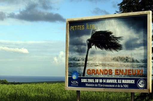 File picture shows a poster bearing the SIDS (Small Islands Developing States) slogan &quot;Small Islands-Big Stakes&quot; in Ma