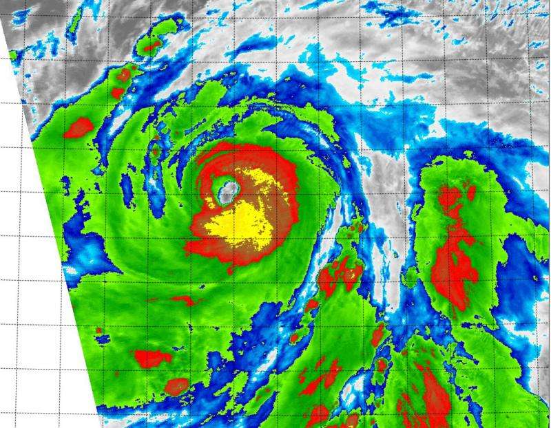 NASA's Terra Satellite sees powerful storms ring Typhoon Atsani's eye