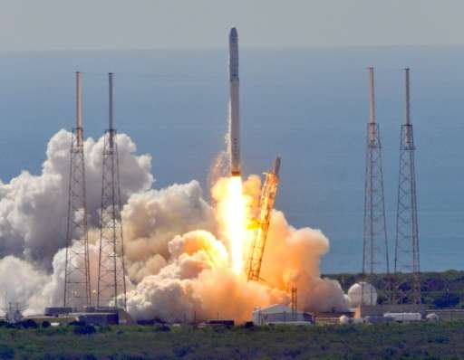 Space X's Falcon 9 rocket lifts off from space launch complex 40 at Cape Canaveral, Florida on June 28, 2015
