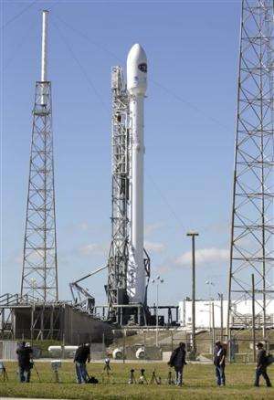 SpaceX tries again to launch observatory, nixes landing test