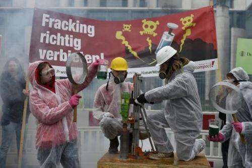 Environmentalists demonstrate in front of the Chancellery in Berlin on April 1, 2015
