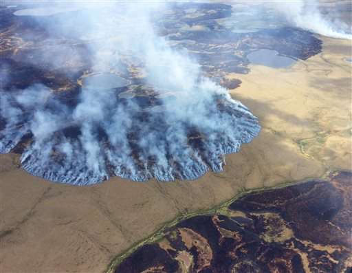 Global warming carving changes into Alaska in fire and ice