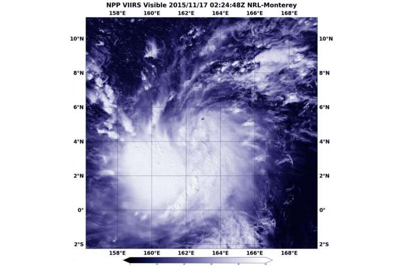 NASA sees tropical storm 27W form in Marianas Islands, warnings up