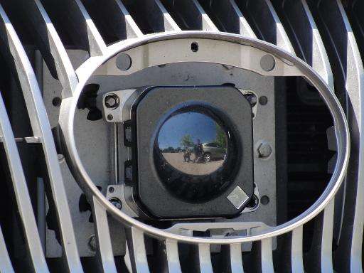 A camera peers out from the front grill of Google's self-driving car in Mountain View, California, on May 13, 2014