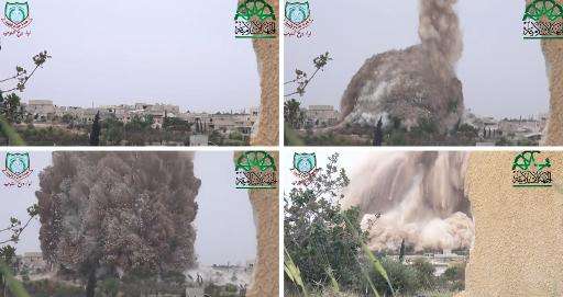 A combo image grab taken from a video uploaded on YouTube by Syria's biggest rebel alliance, the Islamic Front, on May 6, 2014, 