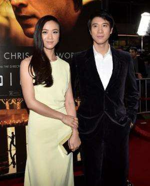 Actors Tang Wei (L) and Wang Leehom at the premiere of &quot;Blackhat&quot; at the Chinese Theatre on January 8, 2015