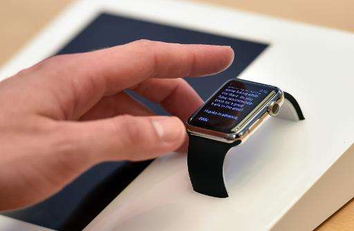 A customer tests a new Apple Watch in Sydney on April 10, 2015