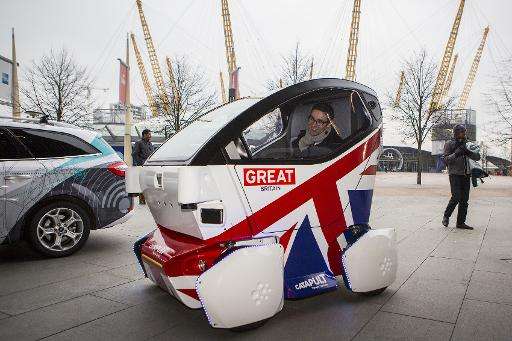 A driverless vehicle known as a Lutz 'Pathfinder' Pod is pictured during a photocall in central London on February 11, 2015