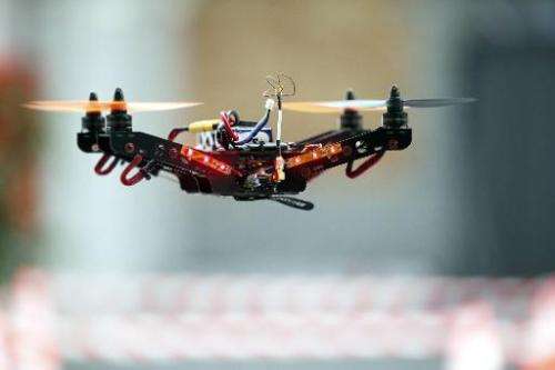 A drone flies at 'Drone-Days', the first fair on drones in Belgium, at Tour and Taxi in Brussels, on March 7, 2015