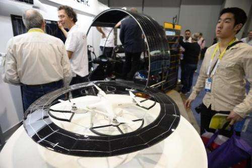 A drone with an attached circular solar panel array is displayed at the Consumer Electronics Show in Las Vegas, Nevada, on Janua