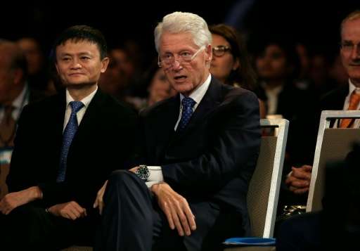 Alibaba Group chairman Jack Ma (L), pictured with former US President Bill Clinton on September 29, 2015, is among backers of th