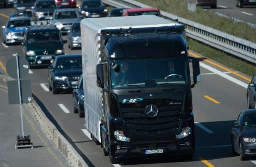A Mercedes-Benz Actros truck equipped with a self-driving system takes to the highway