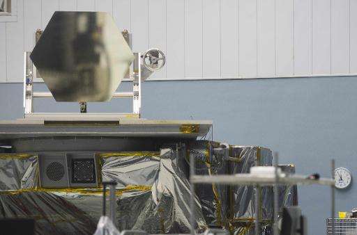 A mirror, similar to the one that will be installed on the James Webb Space Telescope, is displayed in a clean room at the NASA 