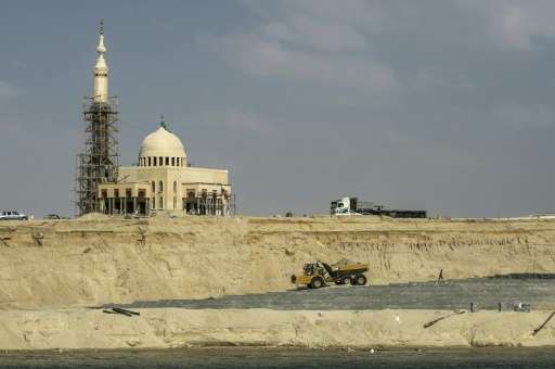 A mosque under construction on the banks of the new waterway of the Suez canal, which will be inagurated on August 6, 2015