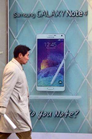 An advert for Samsung Galaxy Note 4 is seen outside a shop in Seoul, on January 8, 2015