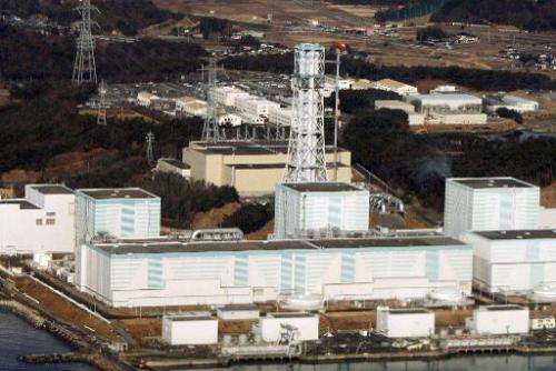 An aerial photo shows the quake-damaged Fukushima Dai-Ni nuclear power plant in the town of Naraha and Tomioka in the Futaba dis
