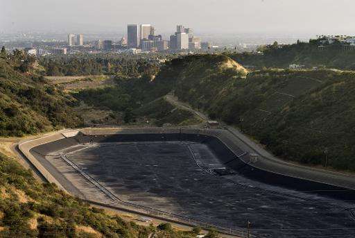 An empty water reservoir is seen in the hills above Los Angeles as a severe drought continues to affect the state of California 
