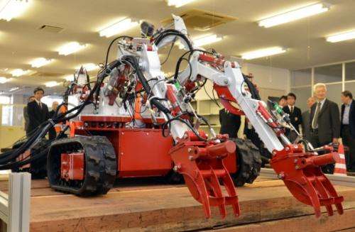 An 'octopus' robot with eight limbs developed to clear rubble in Fukushima, Japan