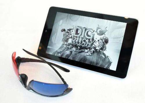 A pair of 3D glasses sit next to a tablet displaying the game Dig Rush at the Game Developers Conference in San Francisco on Mar