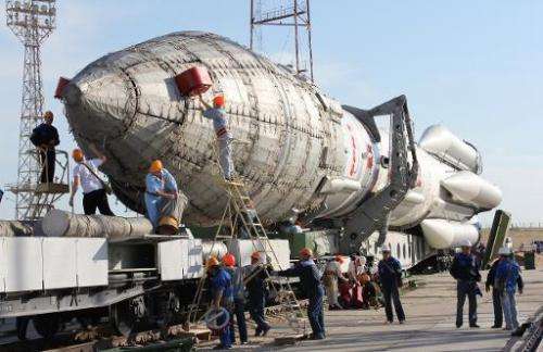A Proton-M rocket is transported to the launch pad at Russian leased Kazakhstan's Baikonur cosmodrome, on May 14, 2012