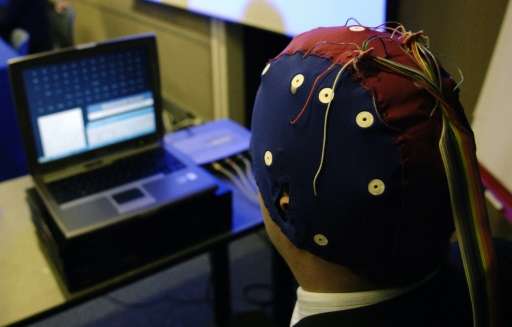 A scientist presents a Brain Computer Interface system on June 8, 2006