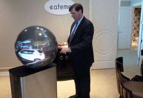 Ateme general manager Mike Antonovich demonstrates the LiveSphere 360-degree television system on January 9, 2015 in Las Vegas, 