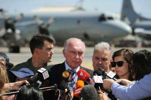 Australian Deputy Prime Minister Warren Truss (C), seen during a press conference at the RAAF Base Pearce, on March 22, 2014