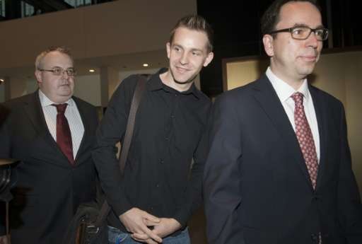 Austrian Max Schrems (C) arrives with his lawyer Herwig Hofmann (R) before a verdict at the European Court of Justice (SCJ) in L