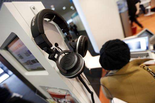 A woman listens to music at last year's MIDEM on February 1, 2014 at the Palais des Festivals, in Cannes