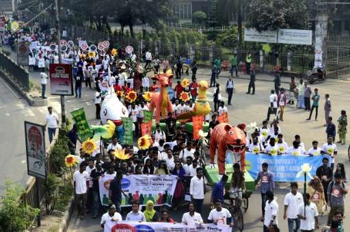 Bangladesh people attend a Climate March rally expressing solidarity with Global Climate March, in Dhaka on November 28, 2015