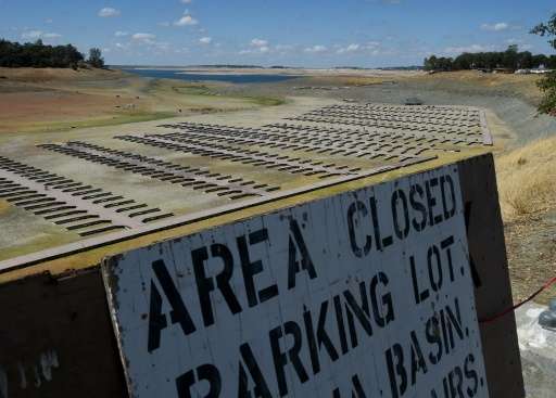 Boat docks sit empty on dry land, as Folsom Lake reservoir near Sacramento stands at only 18% capacity, as the severe drought co