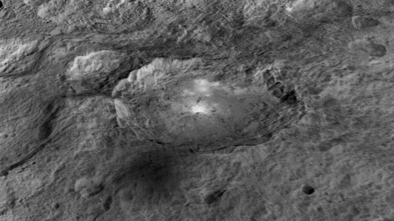 Bright spots and a pyramid-shaped mountain on Ceres